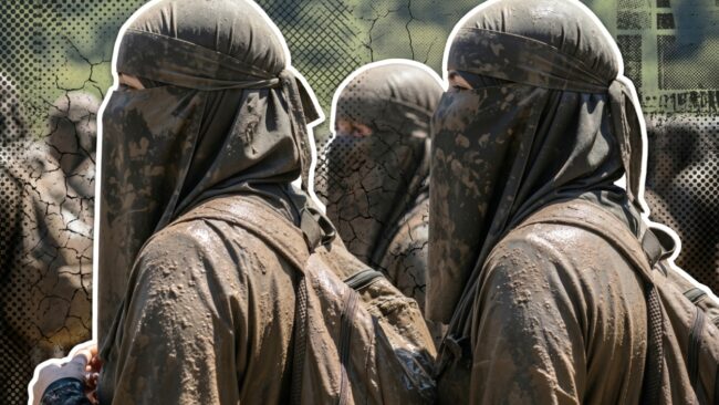 A group of muddy Muslim women take stock ahead of their next obstacle during their challenge