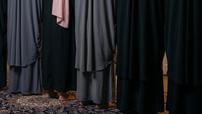 A group of Muslim women pray tahajjud in the depths of the night